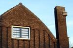 Achterzijde van de woning.
<br/>
Alice Roegholt, 2015